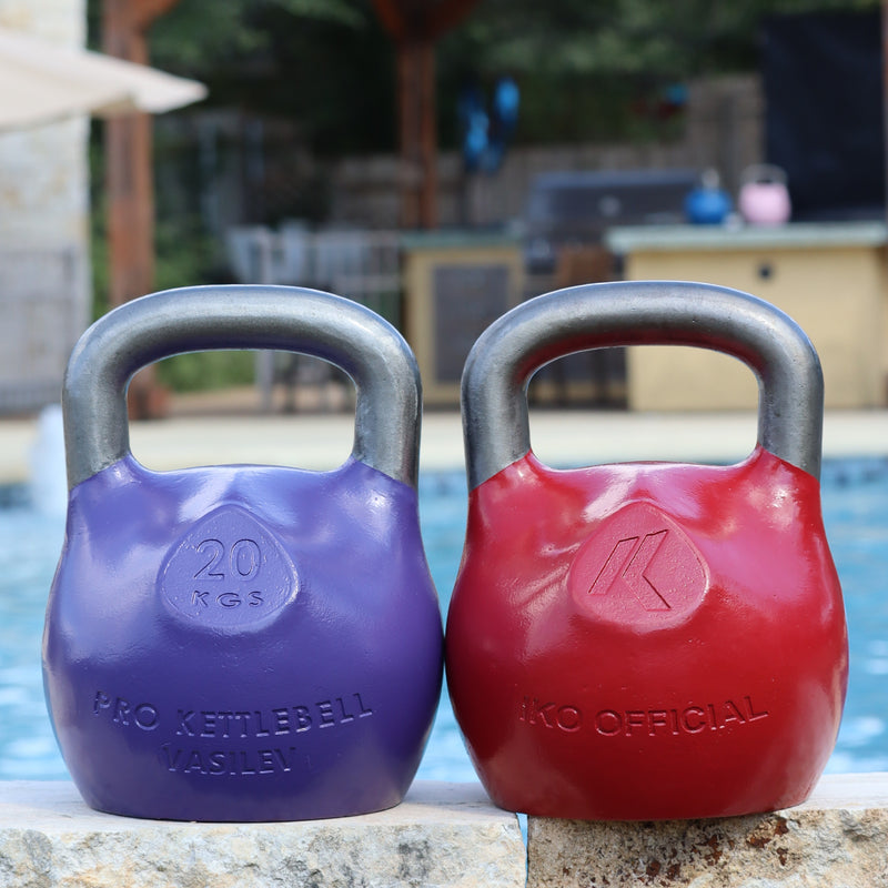 Load image into Gallery viewer, Purple and Red Kettlebells Outside
