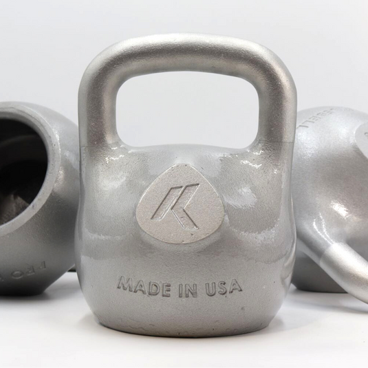 Silver kettlebell with 'Atlas' branding and 'Made in USA' text on a white background